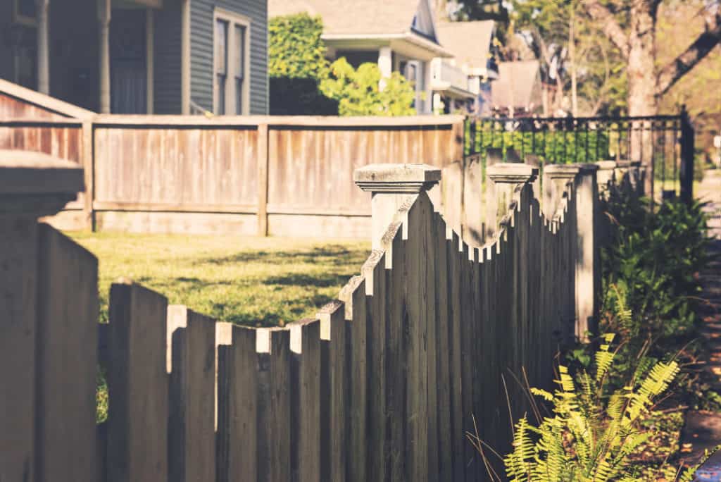 wood fence and houses